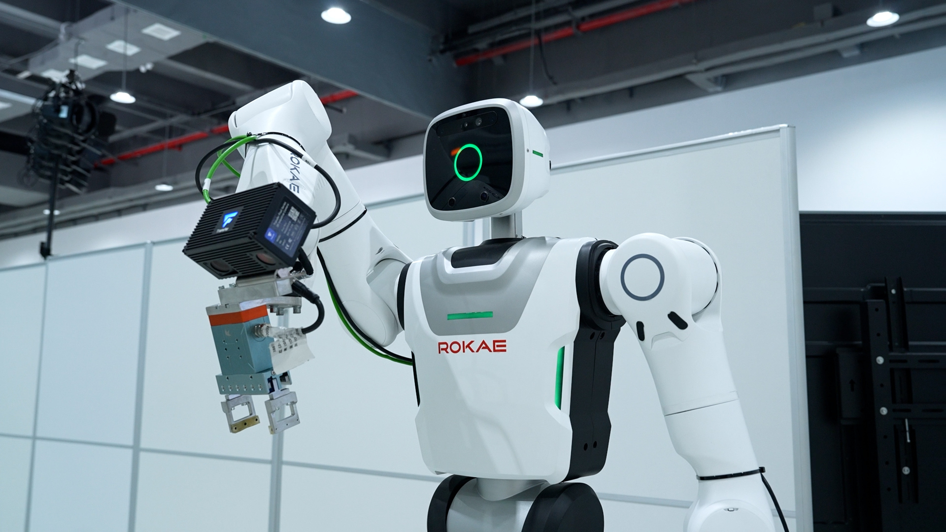 A ROKAE humanoid holds industrial tooling inside Schaeffler’s Taicang factory in a company press photograph.